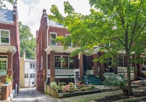 This semi-detached home is nestled at the edge of Rock Creek Park in Historic Mount Pleasant.
