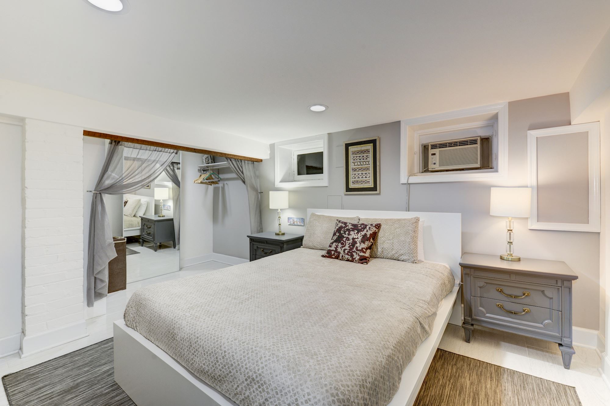 This guest suite houses a 6th bedroom and 3rd full bath for the house.