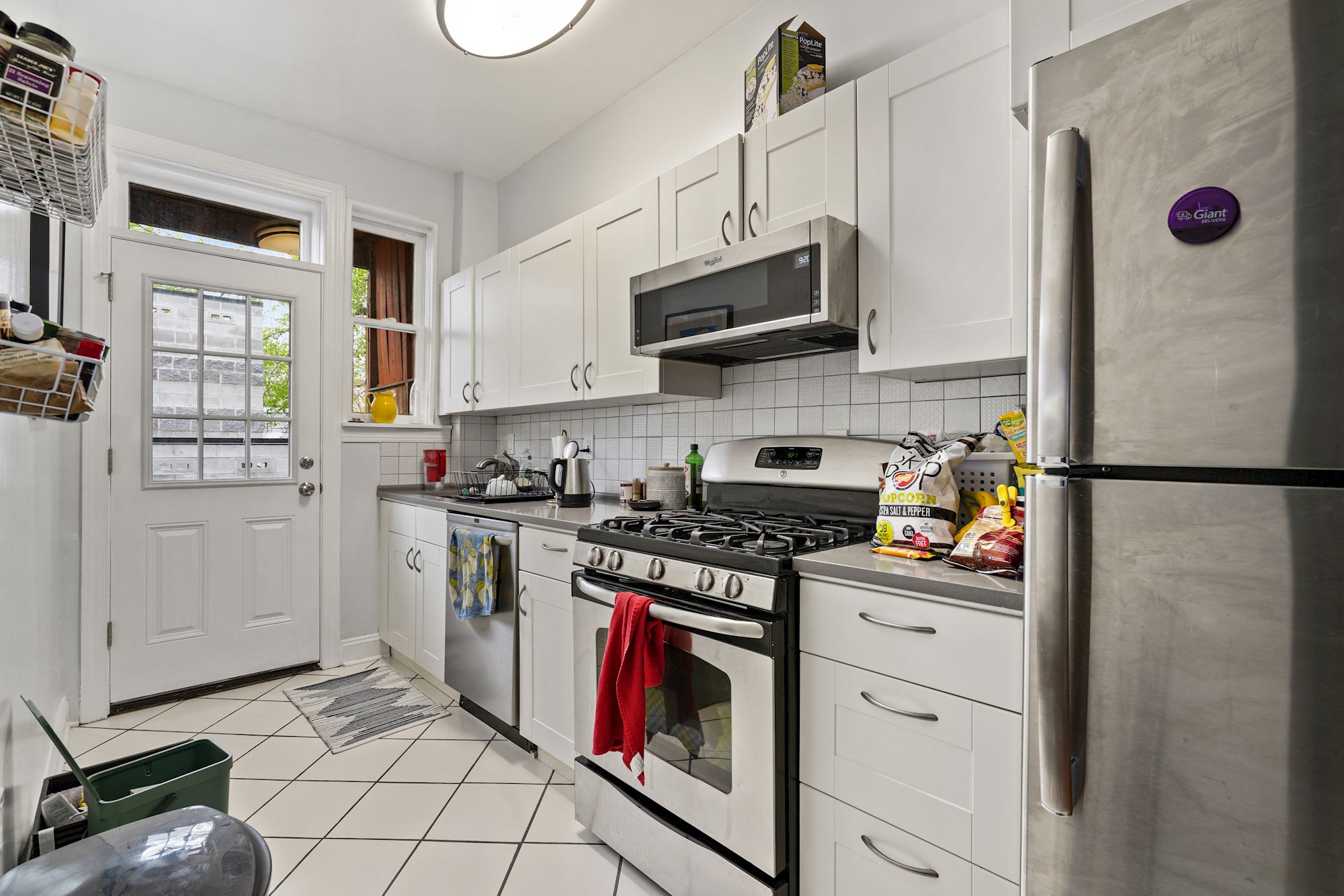 With stylish quartz countertops and stainless steel appliances